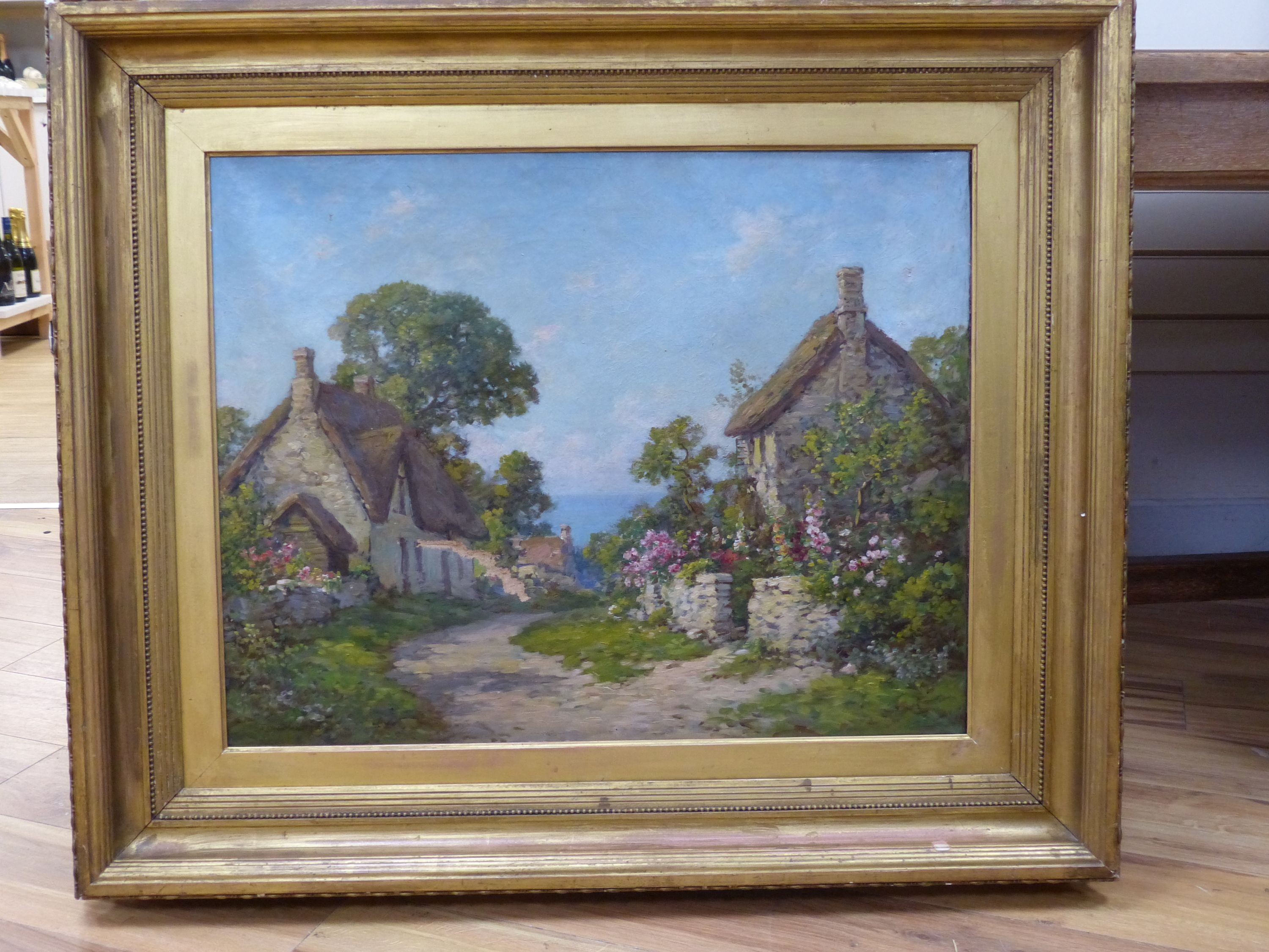 Tom Mostyn (1864-1930), oil on canvas, Coastal cottages, signed, 55 x 70cm